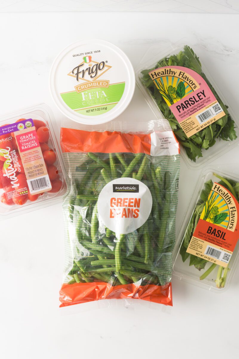 Fresh green beans with tomato and feta cheese combined with herbs and spices