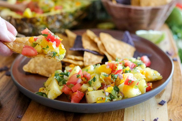Salsa made with pineapple and in a Pineapple rind bowl