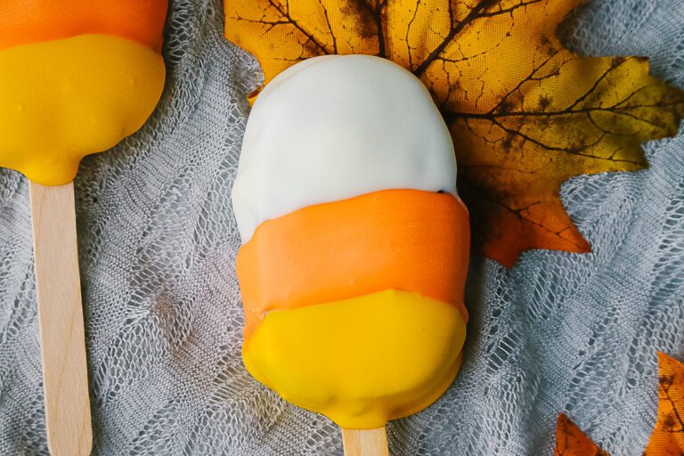 Cake pops that are shaped like candy corn