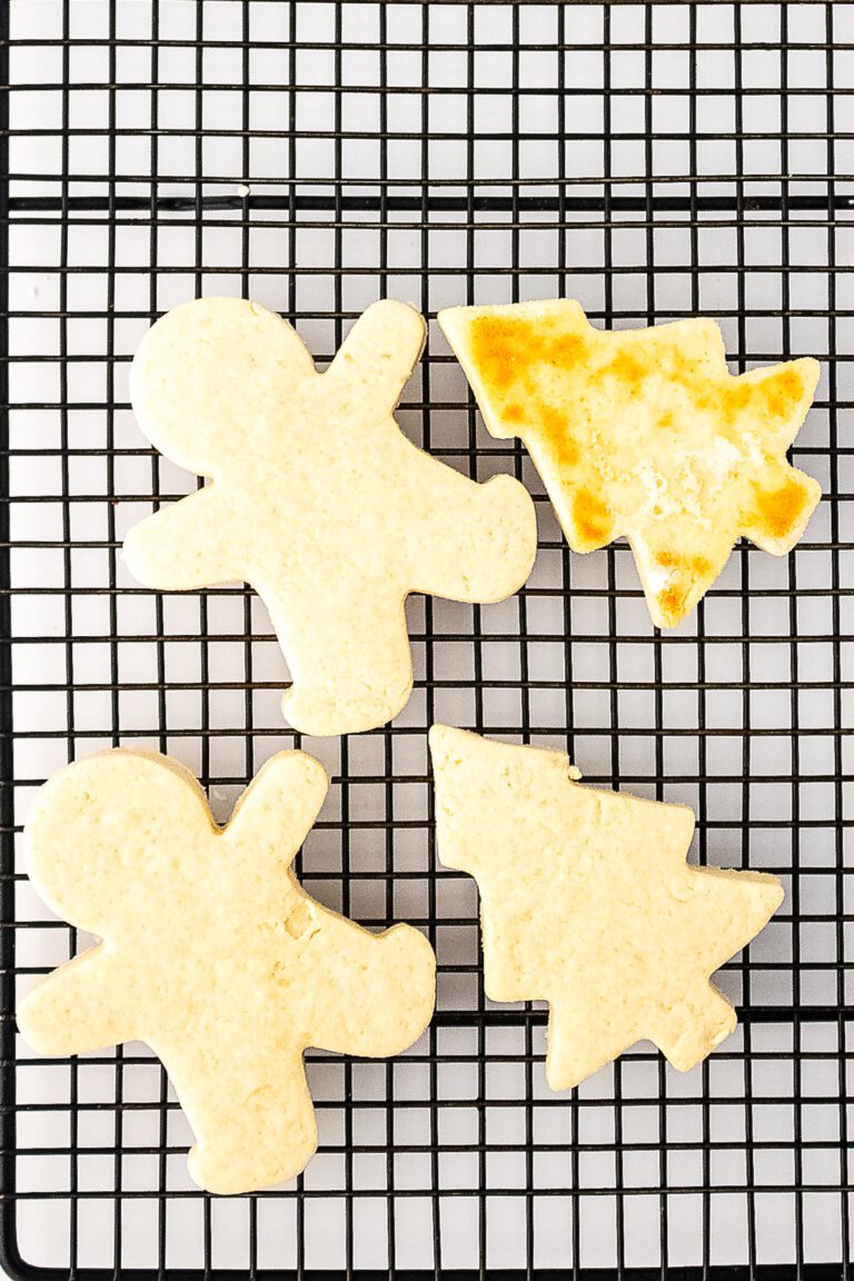 Sugar cookies cut out Christmas cookie cutter decorated with Nutella Frosting