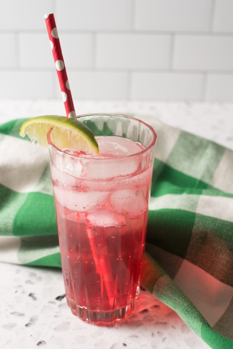 Refreshing Irish Mocktail made with grenadine, lemon and lime juice with lemon-lime soda poured on top.