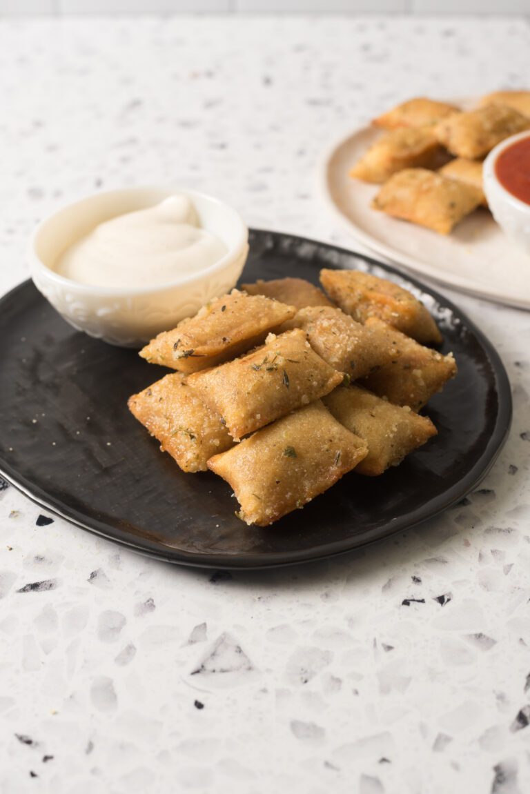 Pizza Rolls made in the air fryer with a special Italian sauce added after cooking!