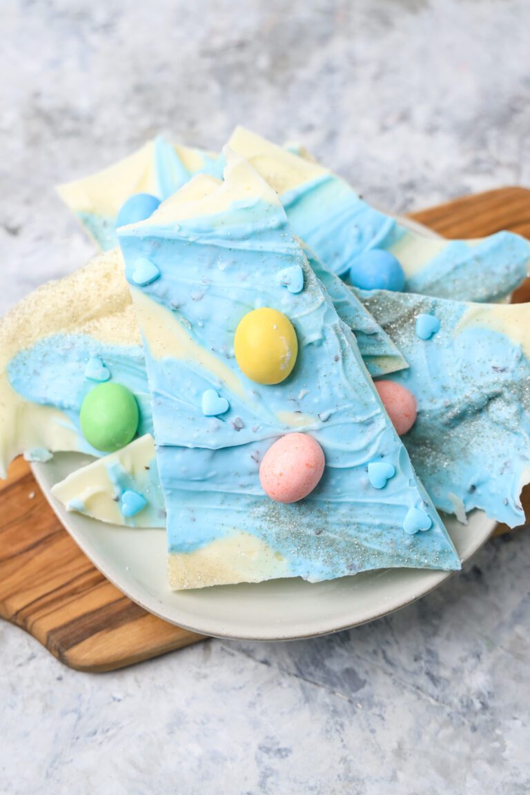 Bark candy made in with blue and white candy melts with a chocolate robins eggs on top. then broken into pieces.