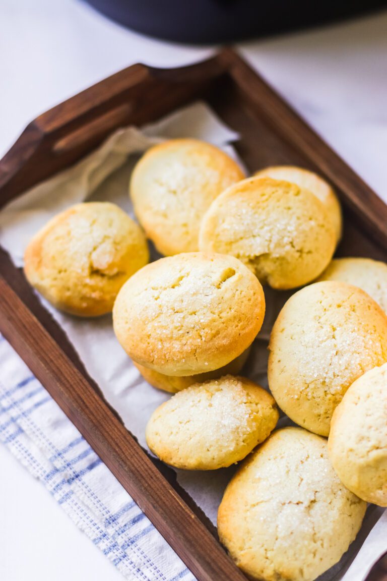 Sugar Cookies made in a air fryer and shown on a wooden tray