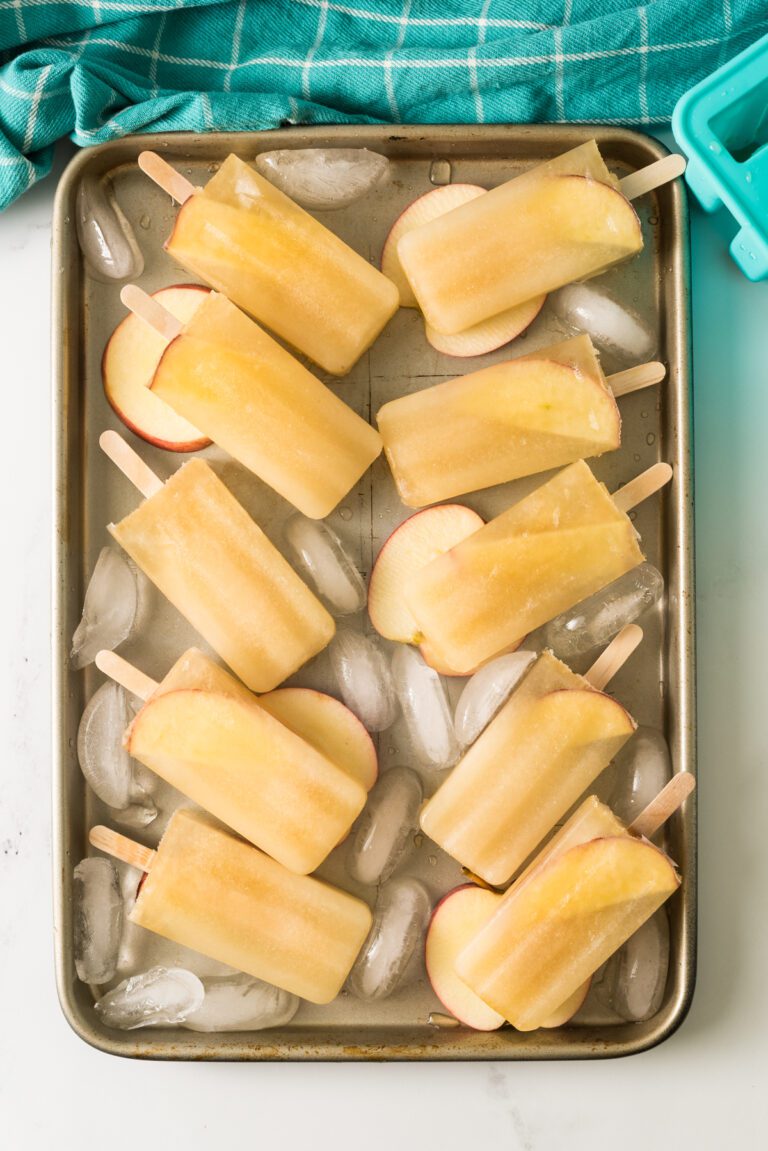 Homemade popsicles made out with apple juice.