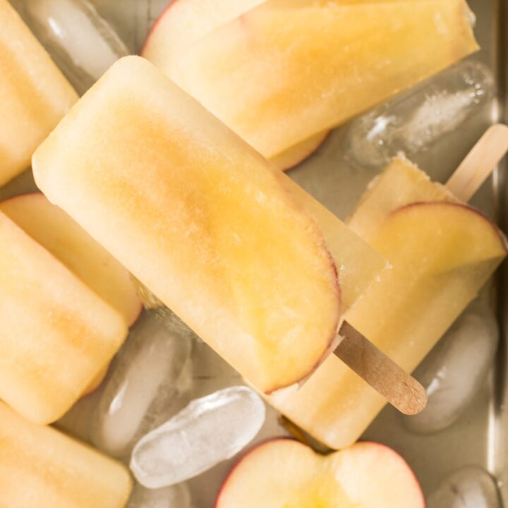 Homemade popsicles made out with apple juice.