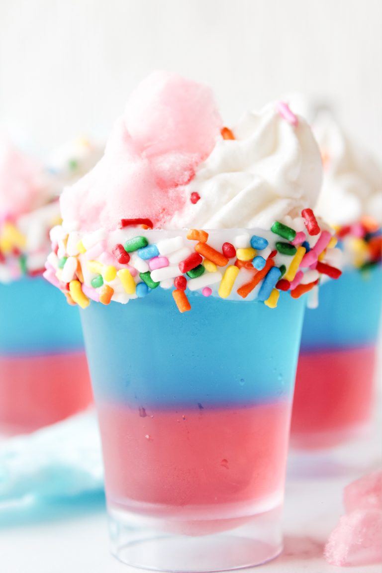 two ounce shot glass with cotton candy flavored jello and Vodka inside