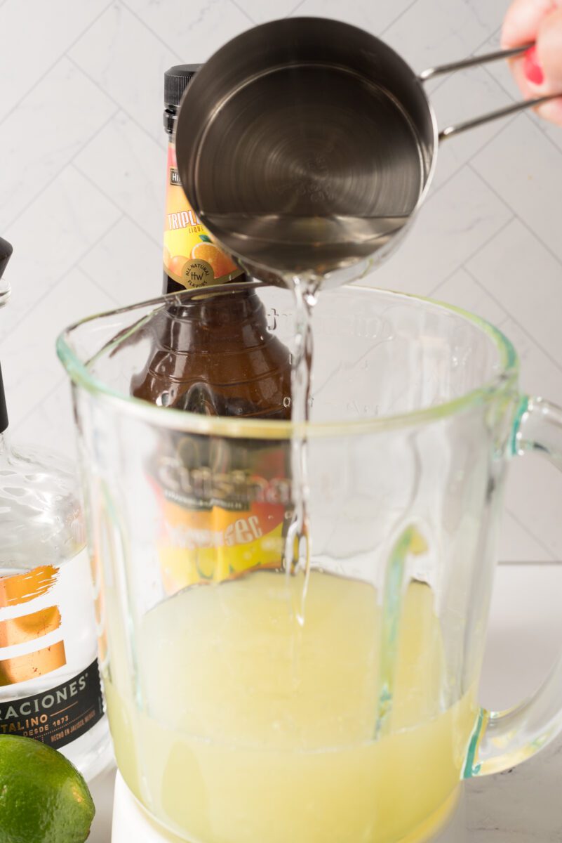 combine limeade, tequila, triple sec, and lime juice