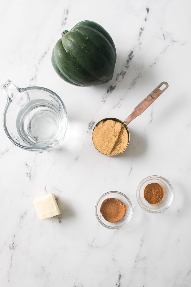 take water, acorn, brown sugar, butter, cinnamon and nutmeg