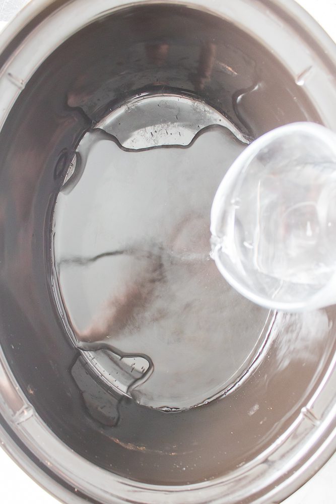 Pour the water into the bottom of the slow cooker