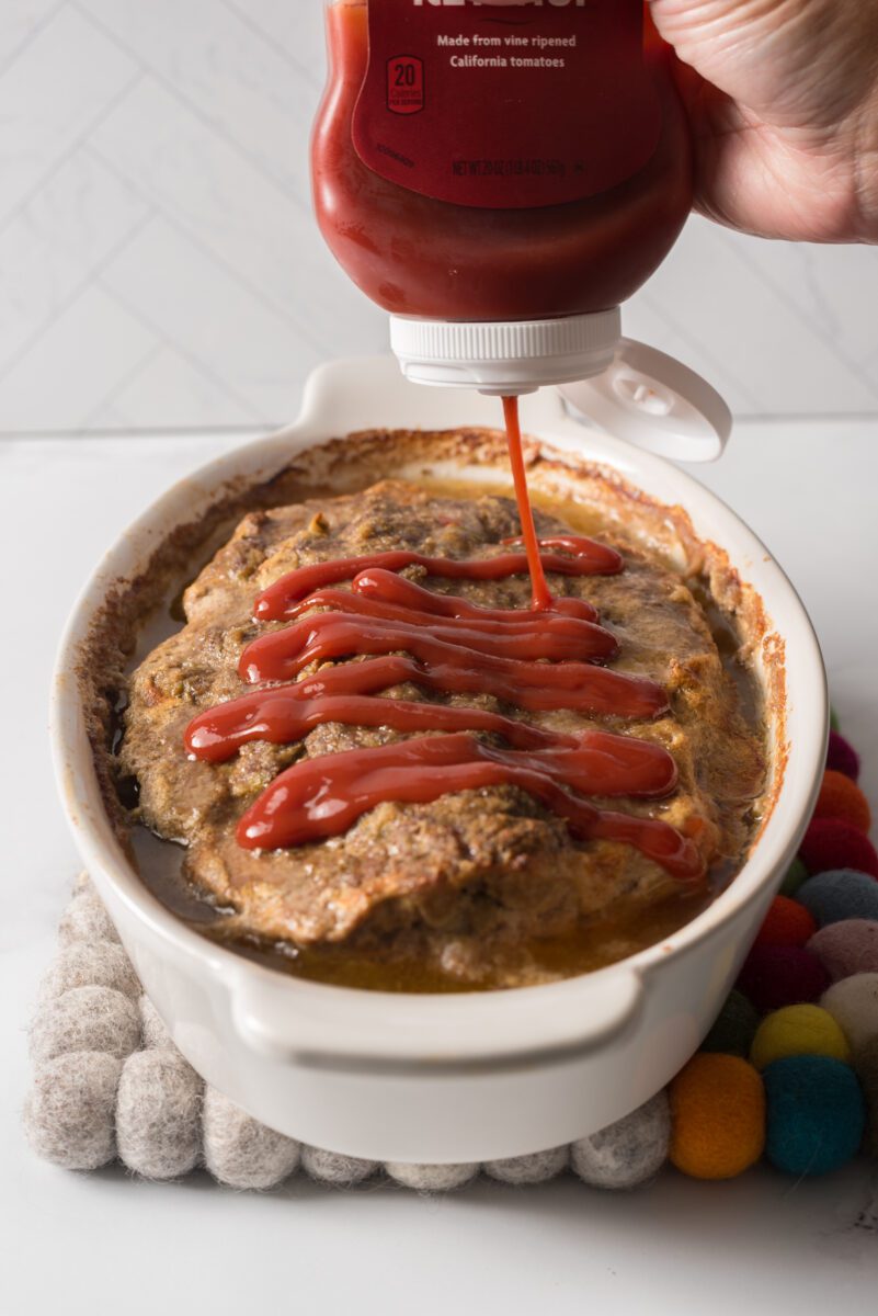 add the ketchup to the top and serve