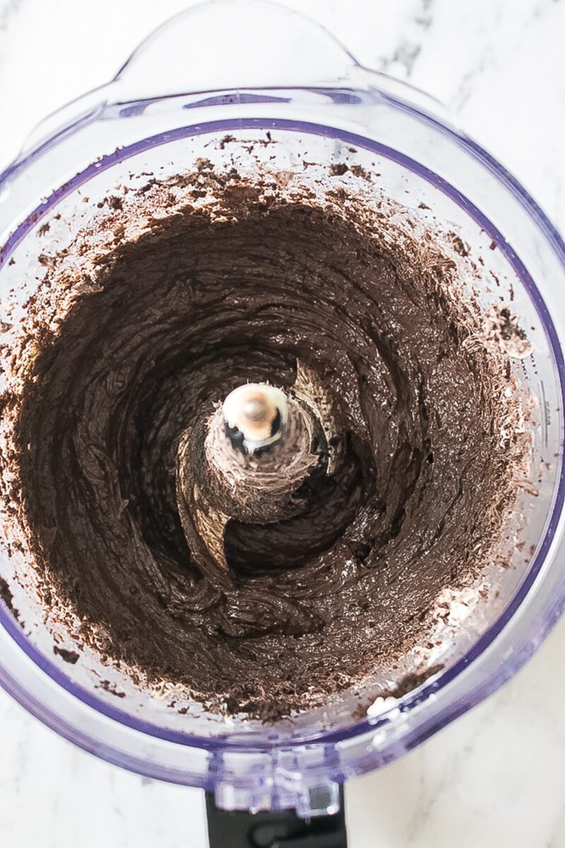 mixing oreo crumbs and cream
