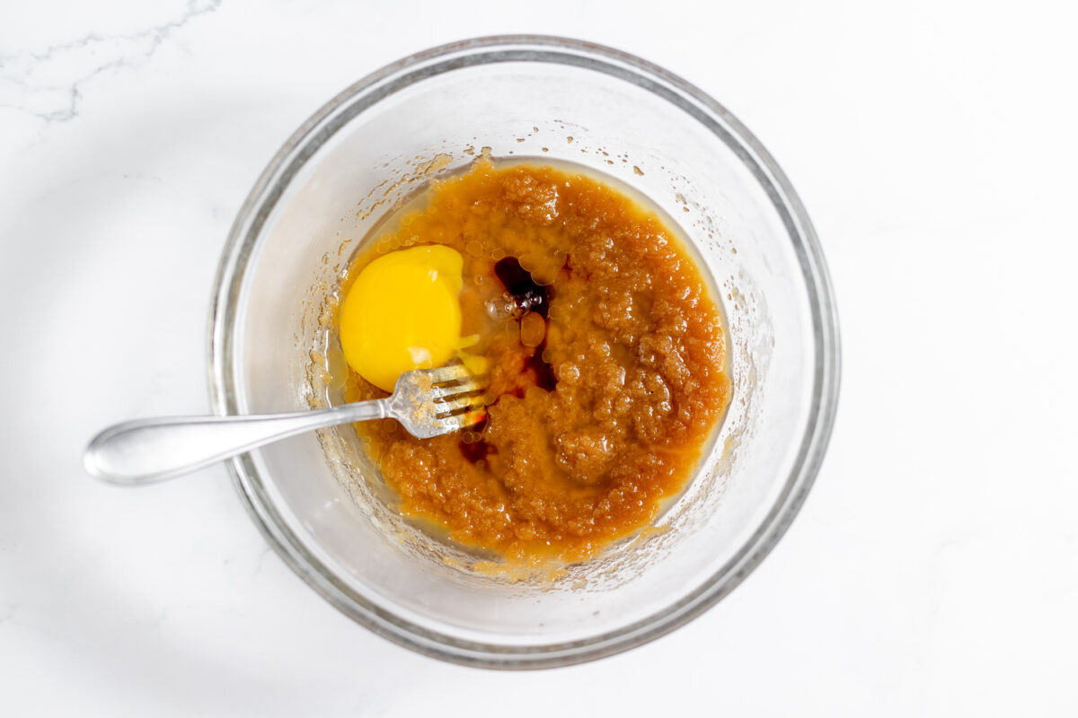 Add in egg and vanilla extract, and whisk