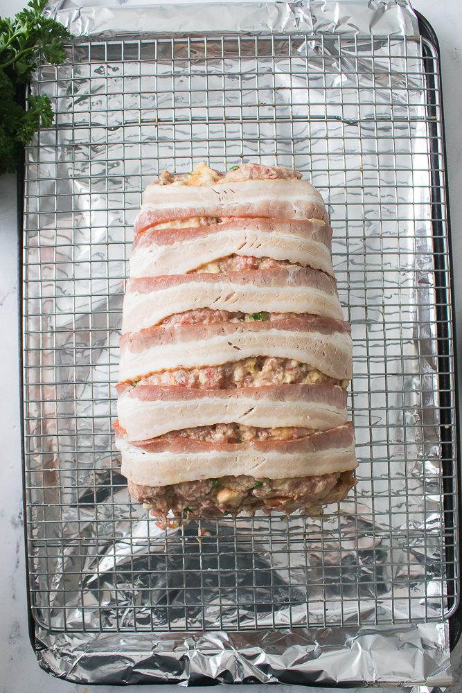 Cver the meatloaf with Bacons