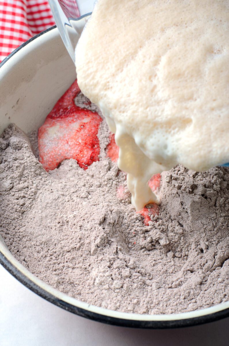 In a large bowl, add the cake mix, flour, and salt Pour in the yeast mixture