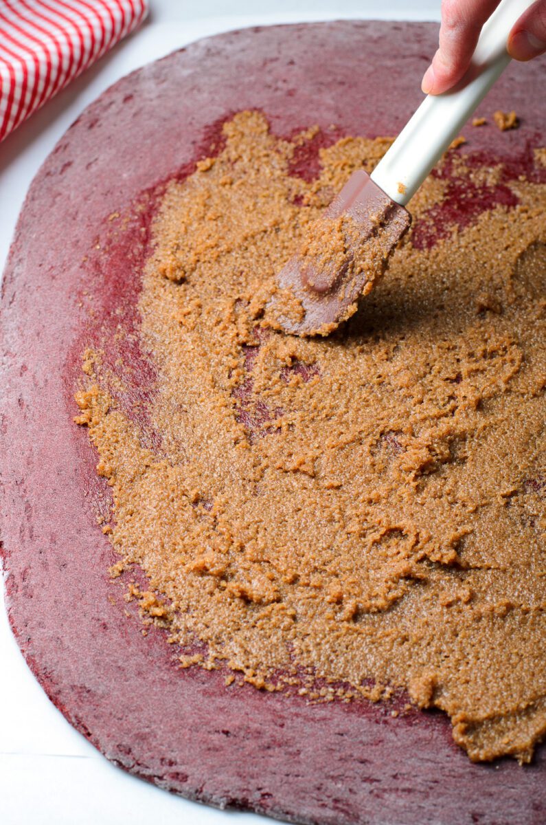 Mix all the ingredients for the cinnamon filling. Spread the mixture over the dough