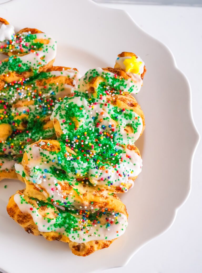Canned Cinnamon Rolls made into Christmas Trees and decorated with sprinkles